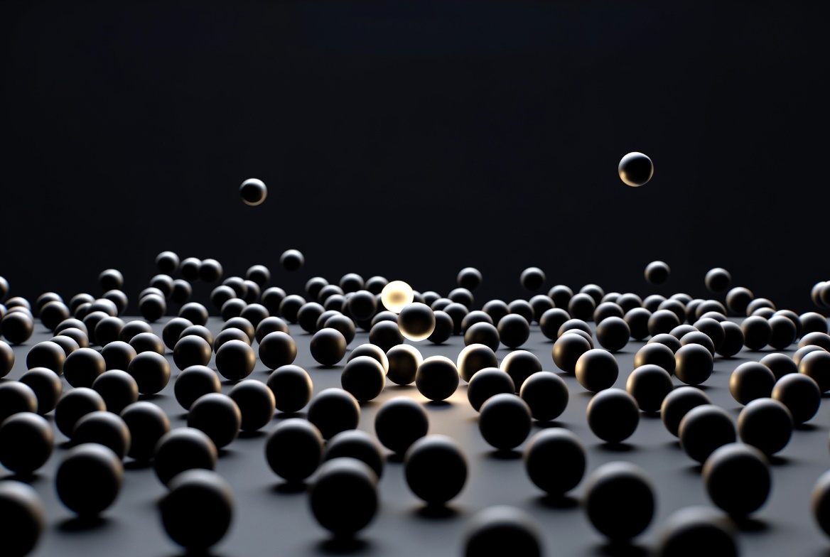 A field of black spheres with a few glowing points.